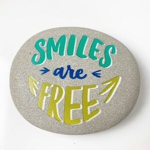 Office Decor Smiles Are Free Oval Paperweight.